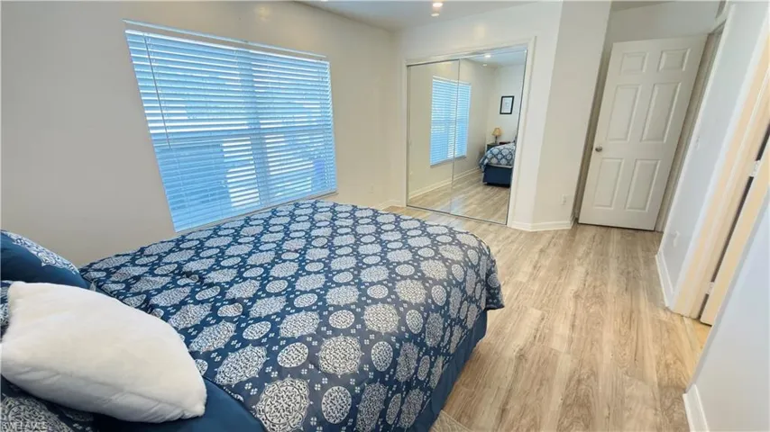 Master Bedroom featuring light wood-style floors and a closet