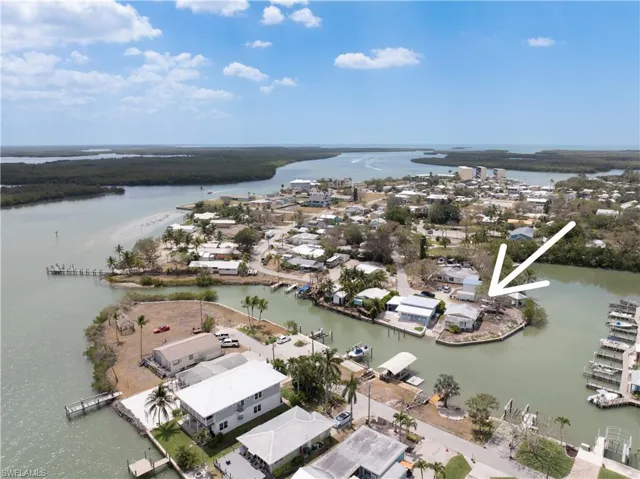 View of property location with a nearby body of water
