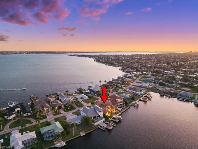 Aerial view at dusk with a water view