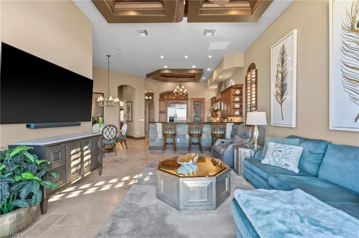 Living room featuring a chandelier