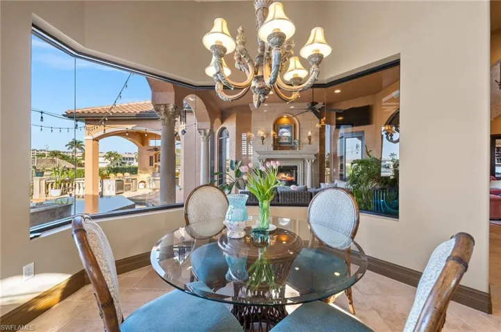 Dining space featuring a notable chandelier