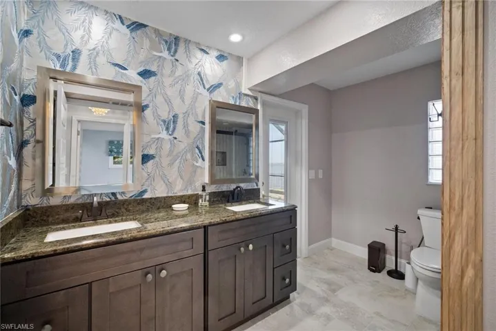 Bathroom with vanity and toilet