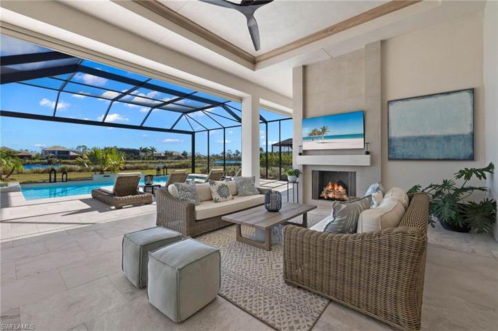 Outdoor Living Under Cover. Upscale Fan fixture, Warming Fireplace!