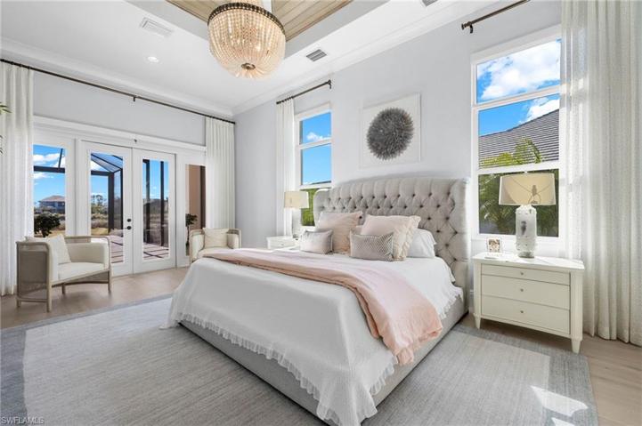 Large Master Bedroom with Beautiful Fixtures, Custom Ceiling Detail, Custom Draperies.