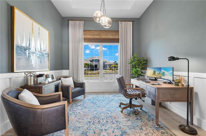 Roomy Office Upgraded with Blonde Wood Flooring, Wainscoting and Custom Draperies.