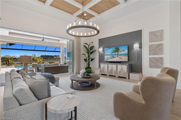 Wow!  What a Design. Custom Ceiling Detail Finished with a Proportionally Sized Light Fixture. Custom Accent Wall.