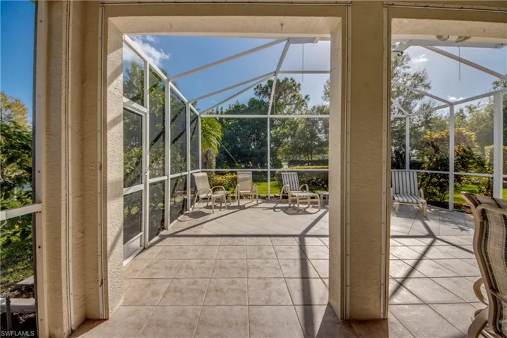 Unfurnished sunroom with a patio area and healthy amount of natural light