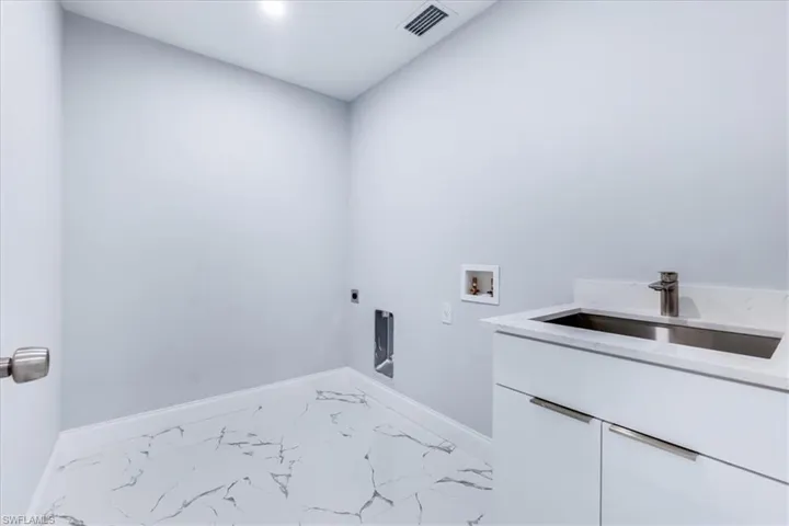 laundry with utility sink