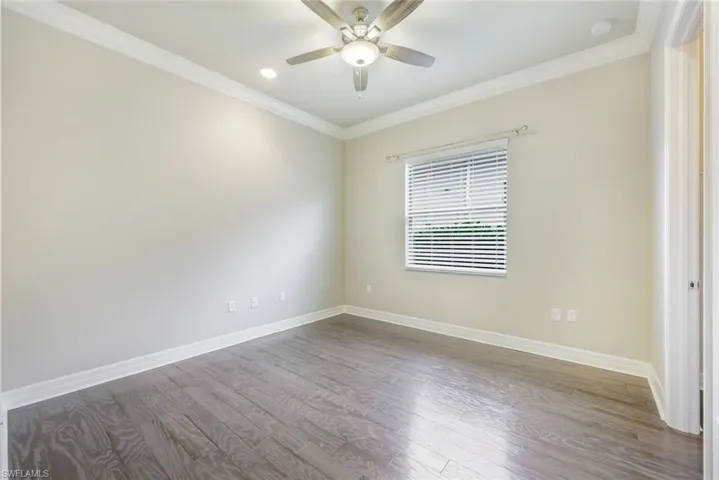 Secondary Bedroom #2  with On Suite Bath, with Wood Flooring and Crown Molding