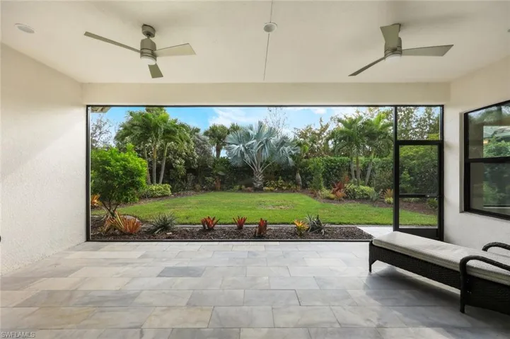 Serene Outdoor Screened Patio with Upgraded Tile Floors, Gorgeous Views and Double Ceiling Fans