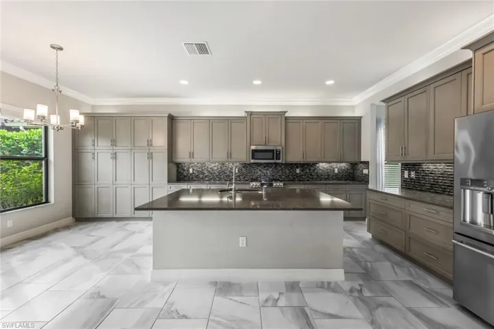 Frontal view- Kitchen with Upgraded GE Cafe Appliance Package.
