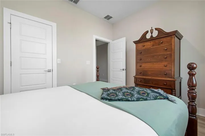 Bedroom featuring wood-type flooring
