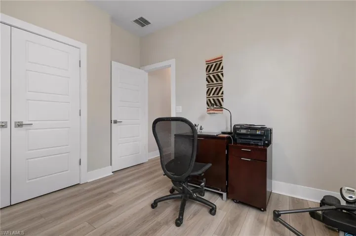 Third Bedroom | Home office with light hardwood / wood-style flooring