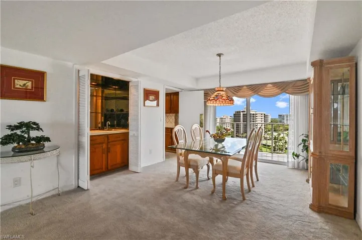 Dining area featuring built-in Bar