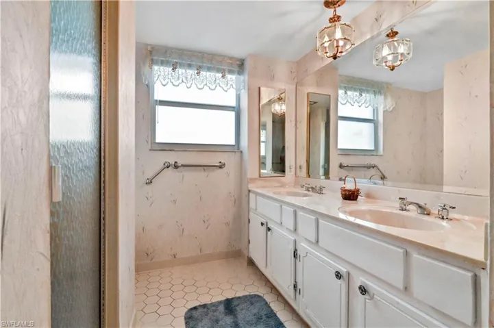 Master bathroom featuring dual sinks