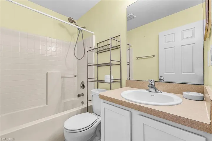 Full bathroom with vanity and shower / tub combination