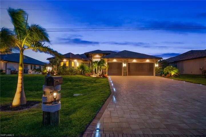 Front Elevation, 3 Car Garage & Paver