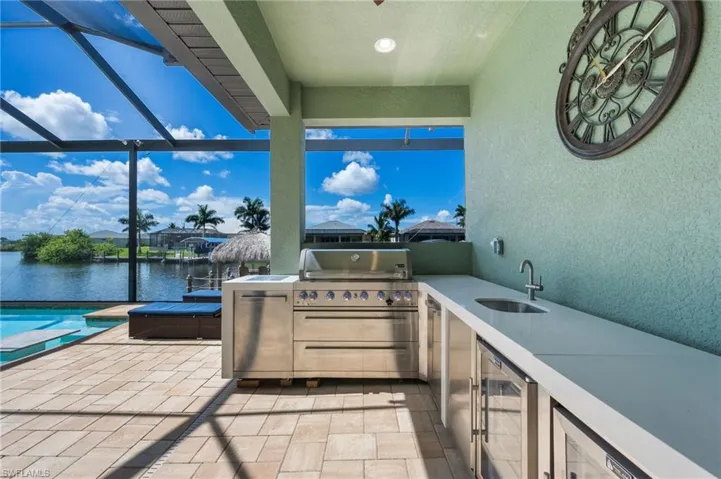 Outdoor Kitchen to include 6 burner gas grill & two mini fridges