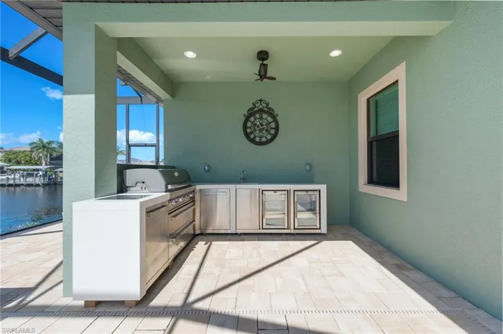 Outdoor Kitchen to include 6 burner gas grill & two mini fridges