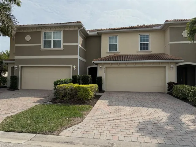 Mediterranean / spanish-style house featuring a garage