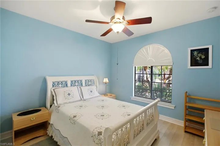 Bedroom featuring ceiling fan and light wood-style floors