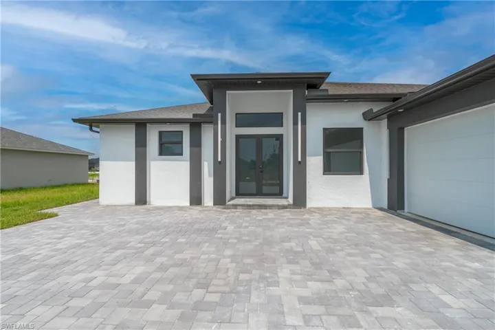 View of front facade featuring french doors