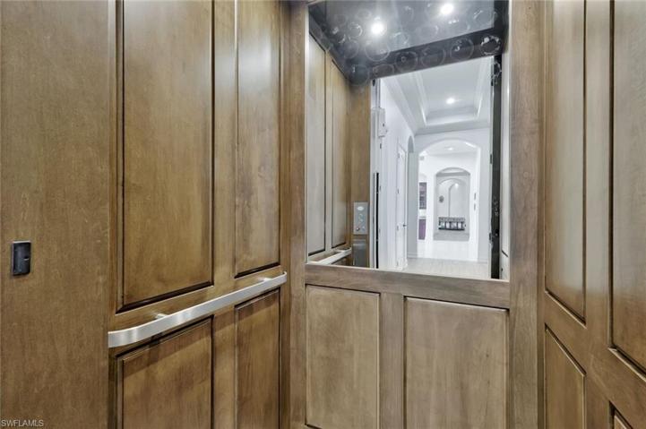 Wood-Paneled Elevator to Upper Level