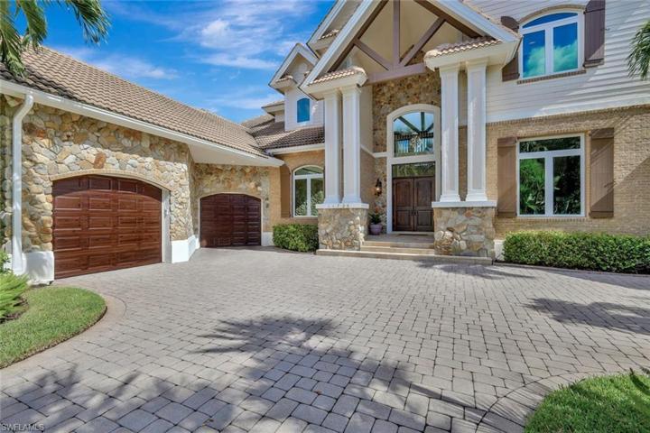 Oversized Side-Entry Garage for 2 Cars + Golf Cart Is Air Conditioned