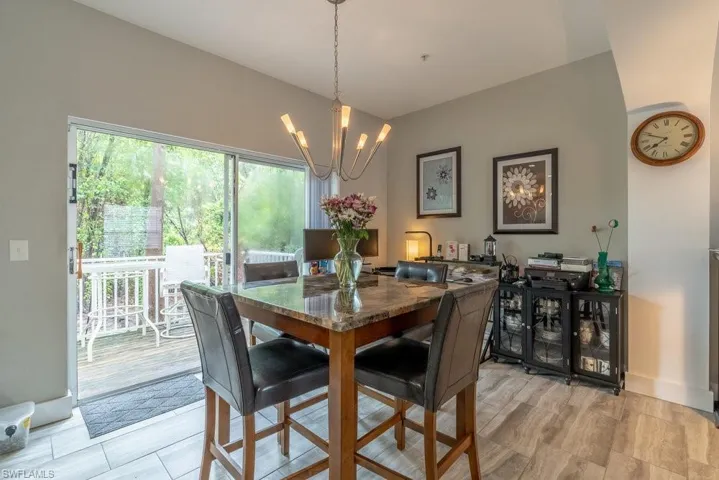 Dining space featuring a notable chandelier