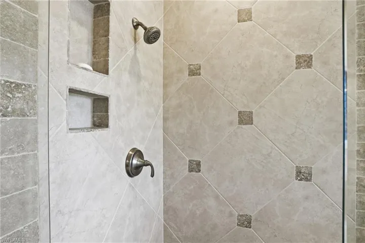 Bathroom view of tiled shower