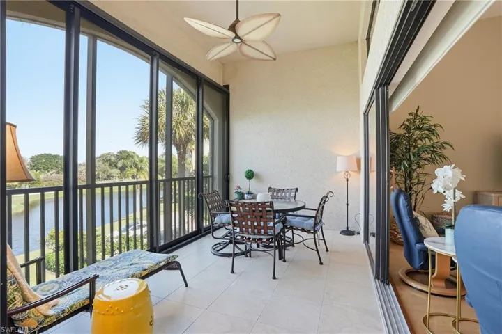 Covered Balcony featuring a water view