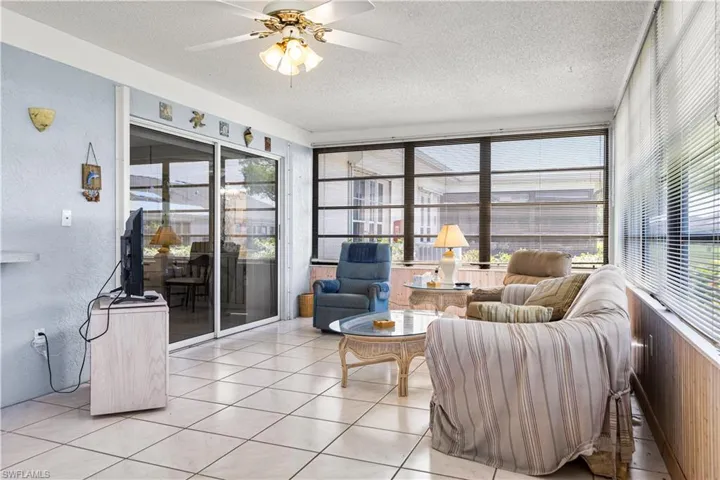 Sunroom with ceiling fan