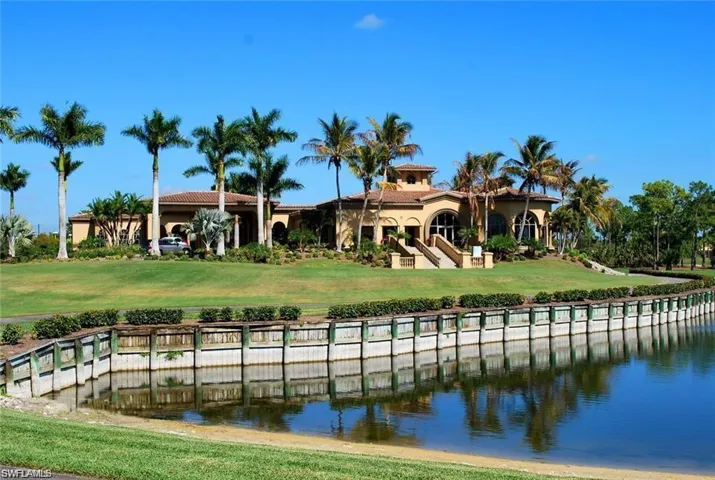 The Players Dock area with a water view and a lawn
