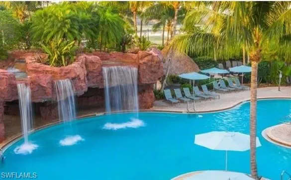 View of pool featuring pool water feature