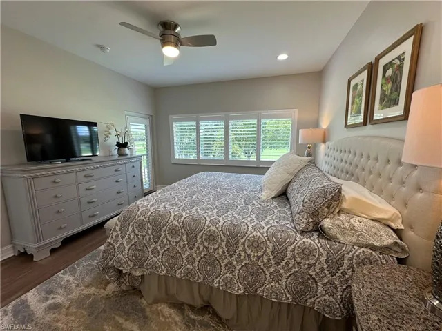 Master Bedroom featuring ceiling fan and dark hardwood / wood-style flooring