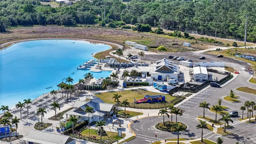six acres of crystalline water, golden sands, swim-up bars, and stunning sunset views