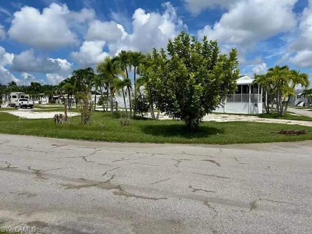 Surrounding community featuring a lawn