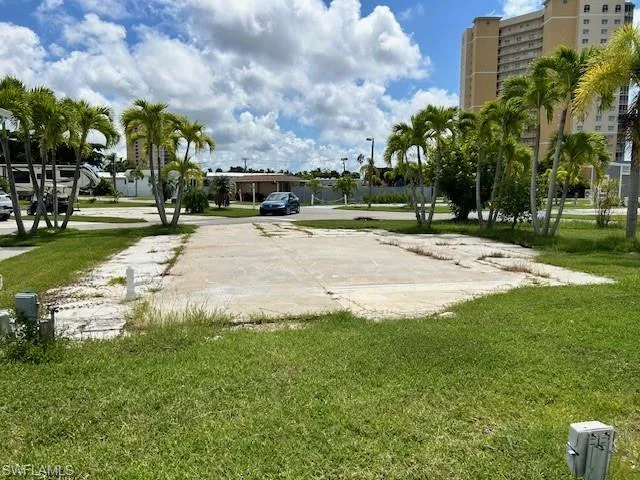 View of community featuring a lawn