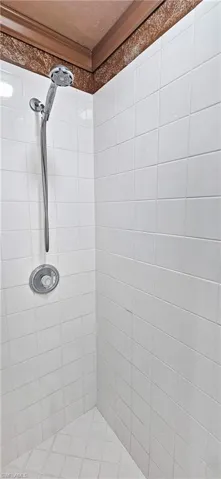 Bathroom featuring tiled shower
