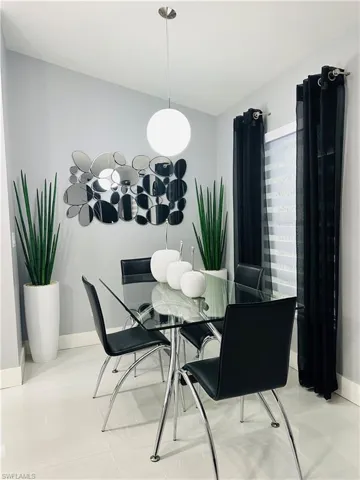 Dining space featuring baseboards