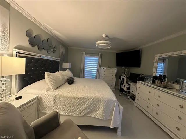 Bedroom with ornamental molding
