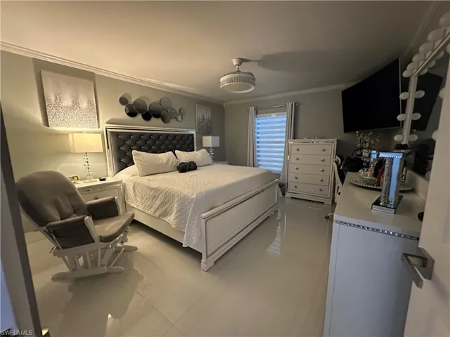 Bedroom with crown molding