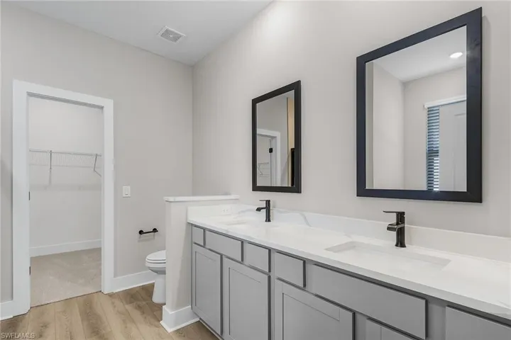 Unfurnished room featuring wood finish floors