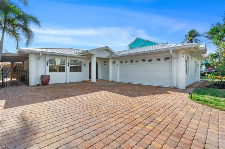 Single story home with a garage