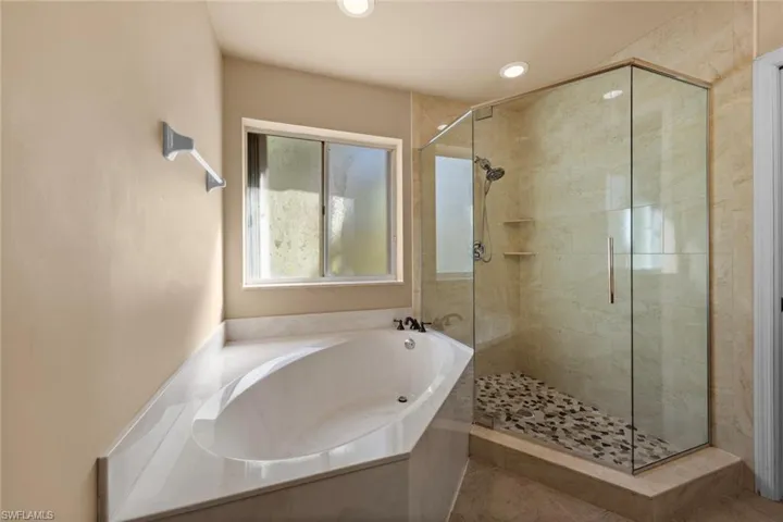 Bathroom with plus walk in shower