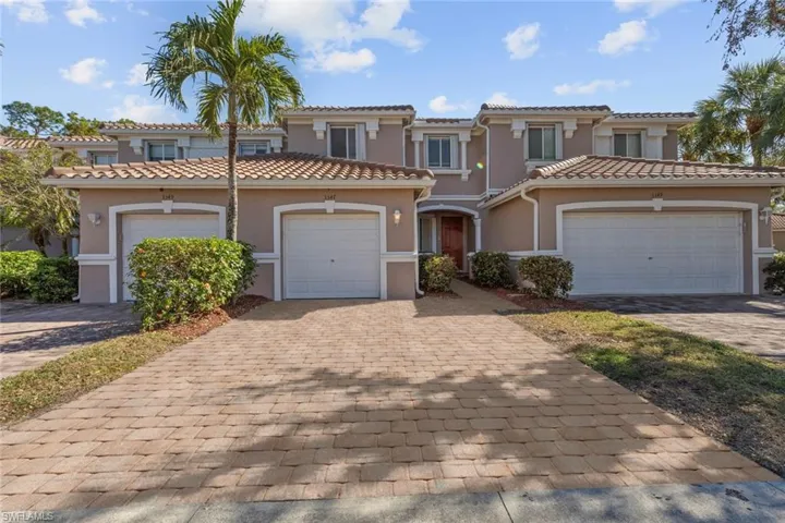Mediterranean / spanish house with a garage
