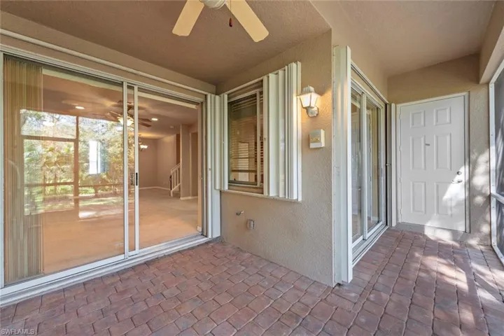 View of patio with ceiling fan