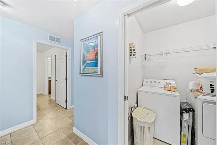 Dedicated laundry closet with wire shelving