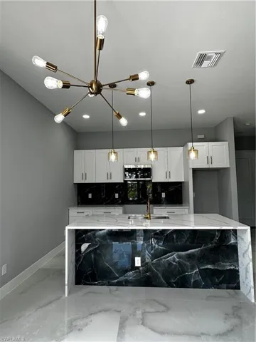 1015  Garnet S AVE, Lehigh Acres, FL 33974