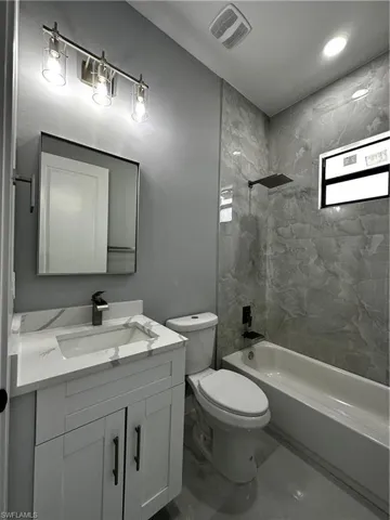 Custom bathroom cabinet sink and light fixture